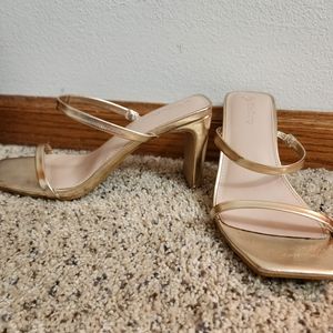 Gold strappy heels
